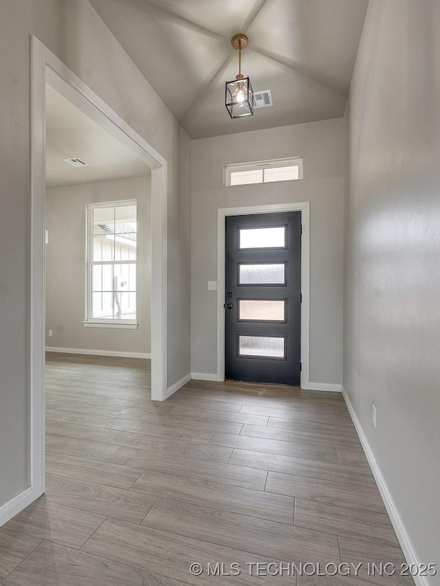 12098 County Road 3513th Loop, Ada, OK 74820 - foyer with wood finished floors and vaulted ceiling