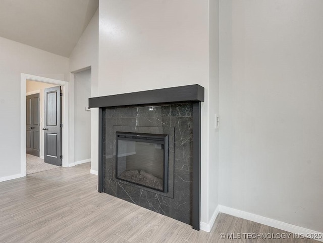 12098 County Road 3513th Loop, Ada, OK 74820 - detailed view of wood finished floors and a glass covered fireplace