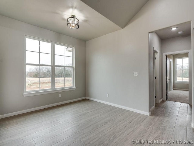 12098 County Road 3513th Loop, Ada, OK 74820 - spare room featuring light wood-style flooring and baseboards