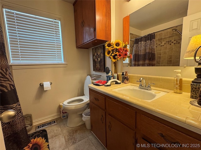 508 W Toledo Pl, Broken Arrow, OK 74012 - full bathroom featuring vanity, a shower with shower curtain, and tile patterned floors