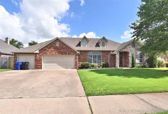 1004 E Fargo St S, Broken Arrow, OK 74012 - view of front of home featuring a garage, driveway, roof with shingles, and brick siding