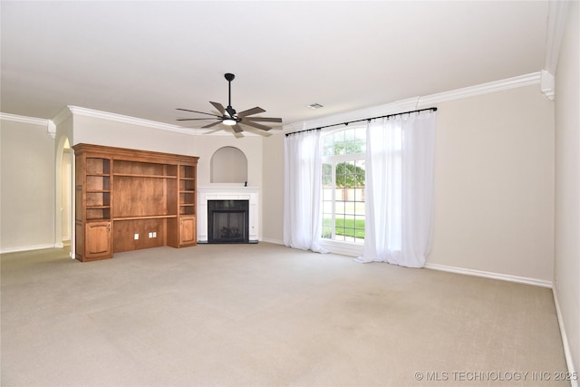 1004 E Fargo St S, Broken Arrow, OK 74012 - unfurnished living room featuring crown molding, a ceiling fan, a fireplace with flush hearth, and light colored carpet
