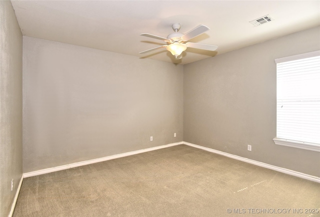 1004 E Fargo St S, Broken Arrow, OK 74012 - carpeted spare room with a ceiling fan and baseboards