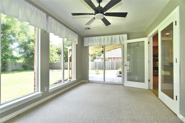 1004 E Fargo St S, Broken Arrow, OK 74012 - unfurnished sunroom with a ceiling fan