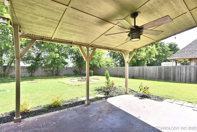 1004 E Fargo St S, Broken Arrow, OK 74012 - fenced backyard featuring a patio and a ceiling fan