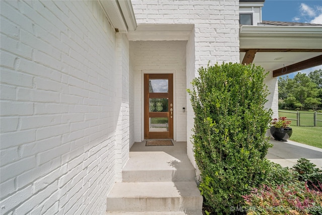 7383 S 288th E Ave, Broken Arrow, OK 74014 - property entrance featuring a shingled roof and brick siding