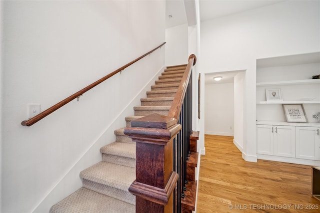 7383 S 288th E Ave, Broken Arrow, OK 74014 - stairway with wood finished floors and built in features