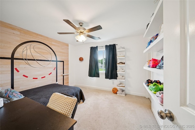 7383 S 288th E Ave, Broken Arrow, OK 74014 - bedroom featuring wooden walls, carpet floors, and a ceiling fan