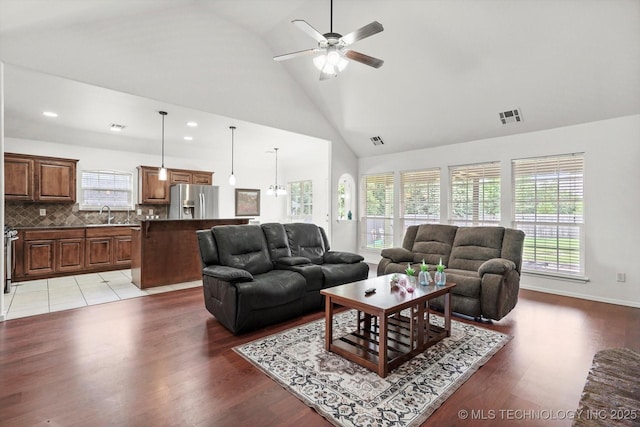 7316 E Knoxville St, Broken Arrow, OK 74014 - living room with light wood-type flooring, ceiling fan, high vaulted ceiling, and recessed lighting