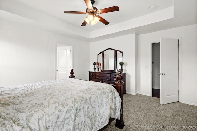 7316 E Knoxville St, Broken Arrow, OK 74014 - bedroom with carpet flooring, ceiling fan, and a raised ceiling