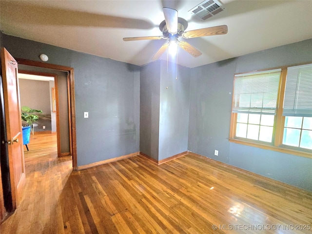 305 Chronister Ave, Drumright, OK 74030 - spare room featuring wood finished floors and a ceiling fan