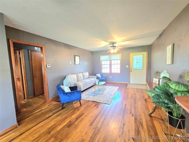 305 Chronister Ave, Drumright, OK 74030 - living room featuring hardwood / wood-style flooring and ceiling fan
