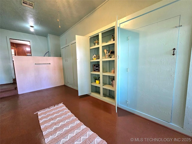 305 Chronister Ave, Drumright, OK 74030 - spare room featuring concrete flooring