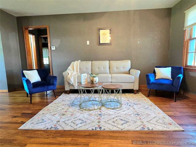 305 Chronister Ave, Drumright, OK 74030 - living room featuring wood finished floors and baseboards