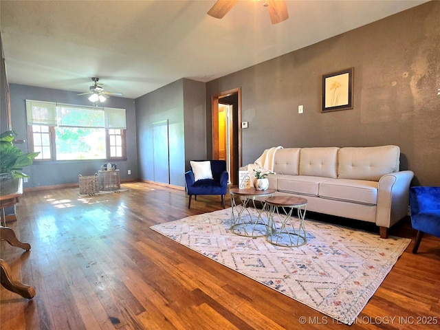 305 Chronister Ave, Drumright, OK 74030 - living room featuring a ceiling fan and wood finished floors