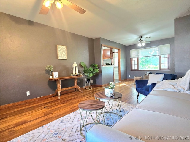 305 Chronister Ave, Drumright, OK 74030 - living room featuring ceiling fan and wood finished floors