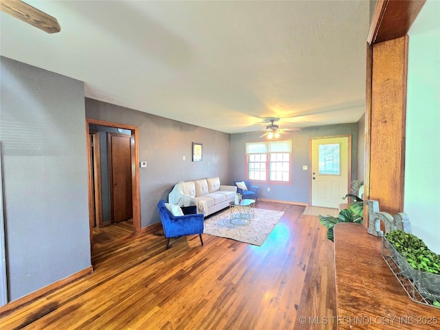 305 Chronister Ave, Drumright, OK 74030 - living area featuring wood finished floors and a ceiling fan