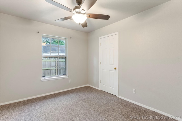 715 S Muskogee St, Sapulpa, OK 74066 - carpeted spare room featuring a ceiling fan and baseboards