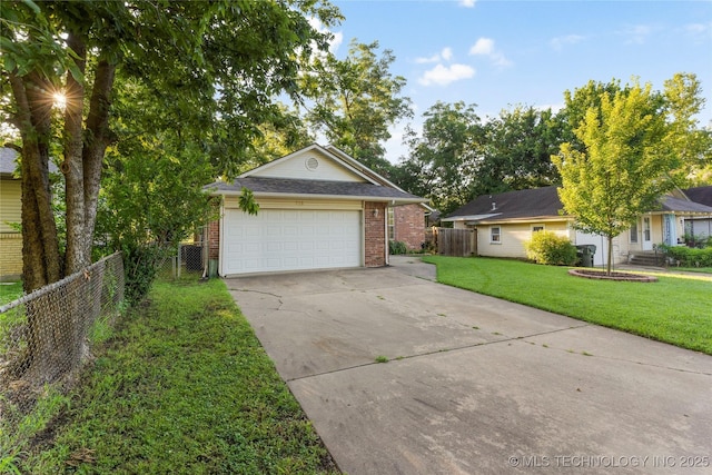 715 S Muskogee St, Sapulpa, OK 74066 - view of front of home featuring brick siding, a garage, and concrete driveway