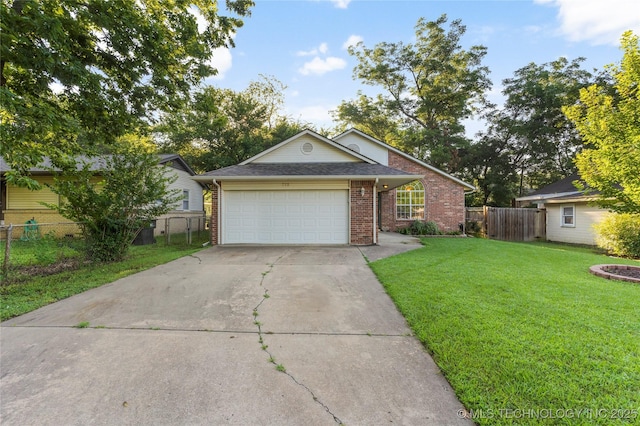 715 S Muskogee St, Sapulpa, OK 74066 - ranch-style home with brick siding, driveway, an attached garage, and roof with shingles