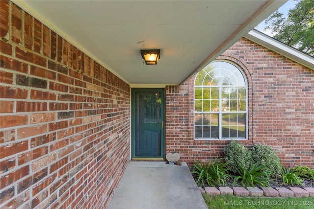 715 S Muskogee St, Sapulpa, OK 74066 - doorway to property with brick siding