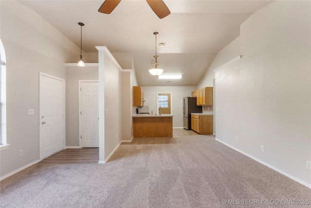 715 S Muskogee St, Sapulpa, OK 74066 - unfurnished living room with lofted ceiling, light colored carpet, and ceiling fan