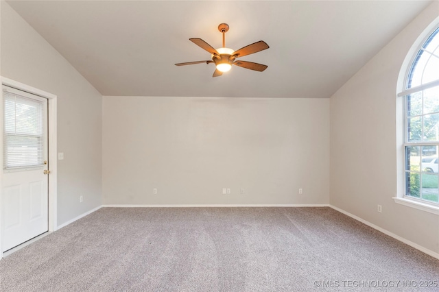 715 S Muskogee St, Sapulpa, OK 74066 - additional living space with a ceiling fan, carpet, vaulted ceiling, and plenty of natural light