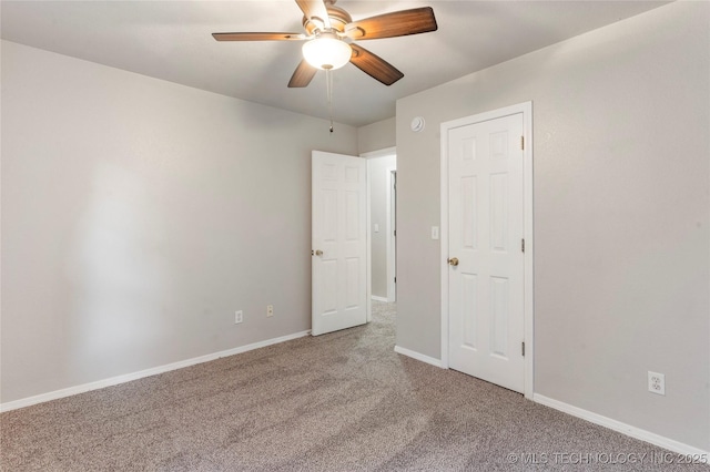 715 S Muskogee St, Sapulpa, OK 74066 - unfurnished bedroom with carpet floors and a ceiling fan