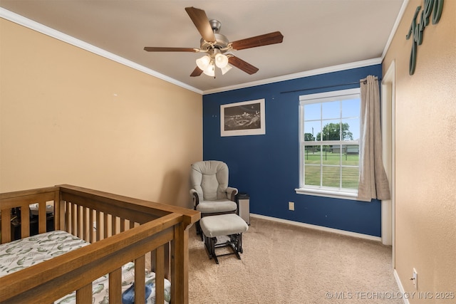 24 Faye Ave, Inola, OK 74036 - carpeted bedroom featuring crown molding, ceiling fan, and a crib