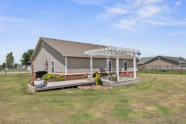 24 Faye Ave, Inola, OK 74036 - back of property featuring a pergola, a shingled roof, and a deck