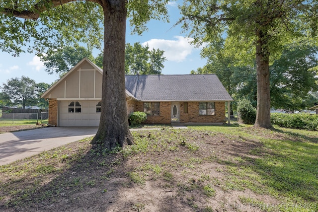 10421 S 197th E Ave, Broken Arrow, OK 74014 - view of front of property with driveway, brick siding, an attached garage, and roof with shingles