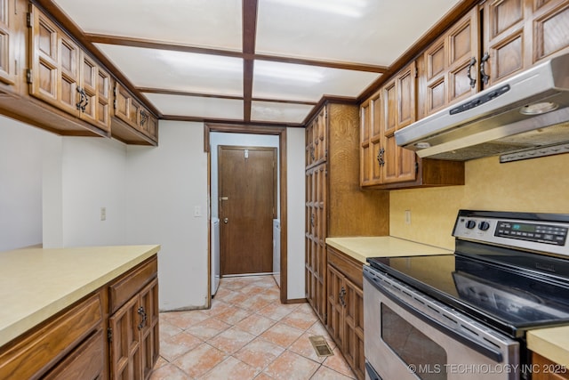 10421 S 197th E Ave, Broken Arrow, OK 74014 - kitchen featuring stainless steel electric range, brown cabinetry, under cabinet range hood, and light countertops