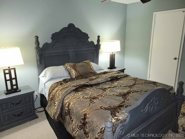 450 W 7th St Unit 704, Tulsa, OK 74119 - bedroom featuring light carpet