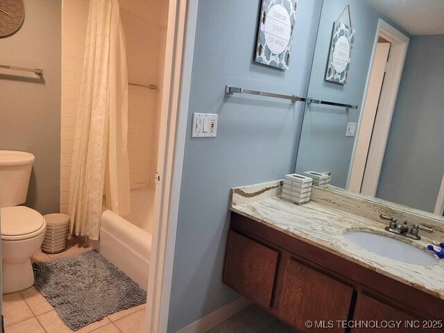 450 W 7th St Unit 704, Tulsa, OK 74119 - full bathroom with vanity, tile patterned floors, and shower / bath combination with curtain