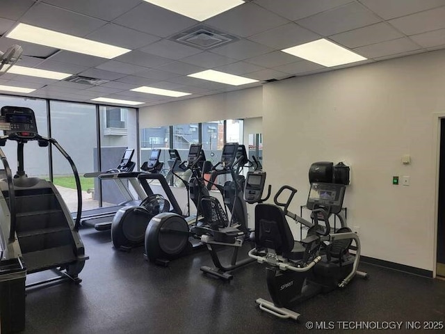 450 W 7th St Unit 704, Tulsa, OK 74119 - gym with a drop ceiling and baseboards