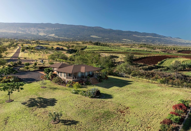 bird's eye view featuring a mountain view and a rural view