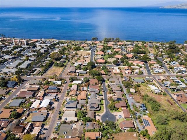 birds eye view of property featuring a residential view and a water view