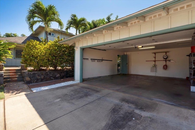 garage with driveway