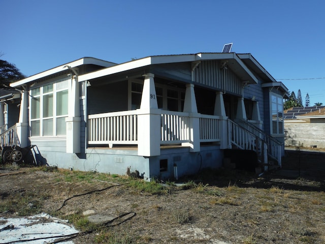 view of home's exterior with covered porch