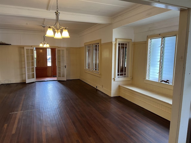 entrance foyer with crown molding, a chandelier, beamed ceiling, french doors, and dark wood-style floors