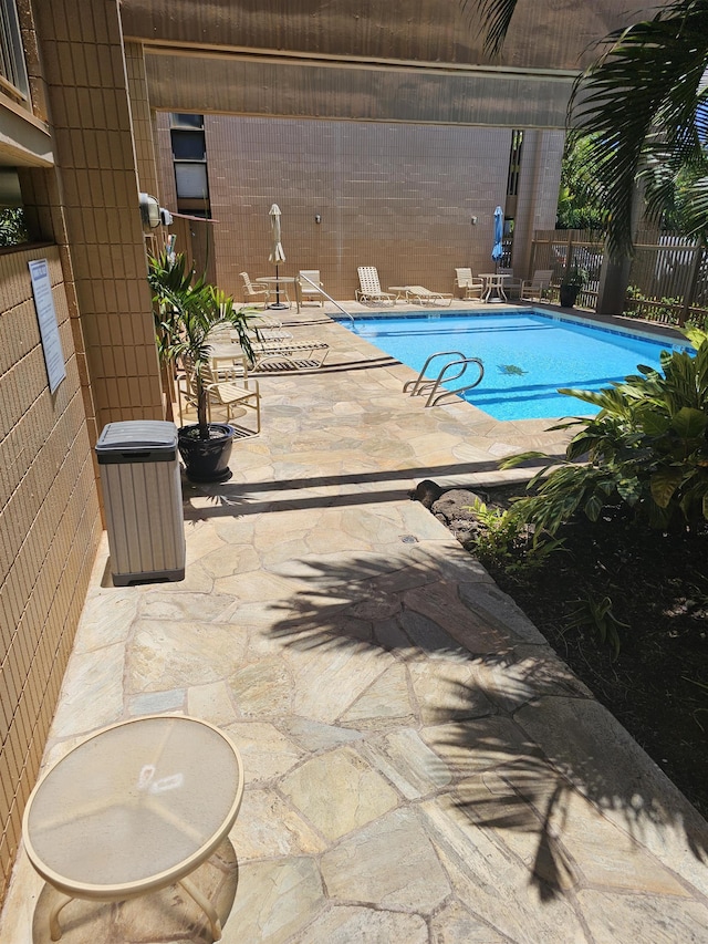3785 Lower Honoapiilani Rd Unit 103, Lahaina, HI 96761 - community pool featuring a patio and fence