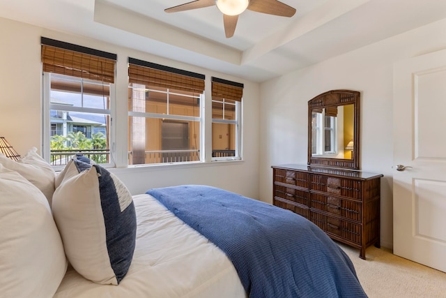 28 Hauwahine Ln Unit F203, Kihei, HI 96753 - bedroom featuring carpet floors, a tray ceiling, and ceiling fan