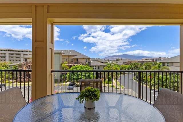 28 Hauwahine Ln Unit F203, Kihei, HI 96753 - balcony featuring outdoor dining space, a mountain view, and a residential view