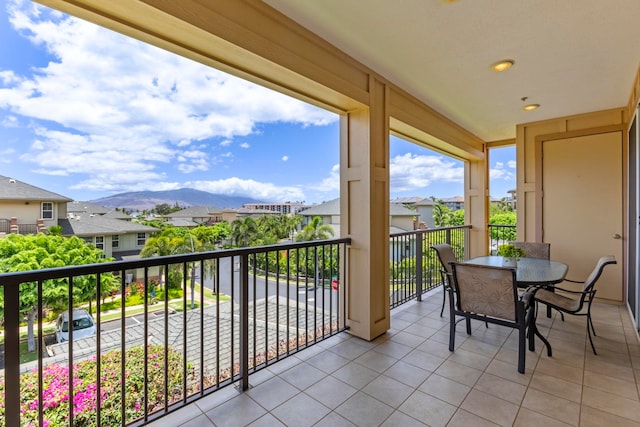 28 Hauwahine Ln Unit F203, Kihei, HI 96753 - balcony featuring a mountain view, a residential view, and outdoor dining area