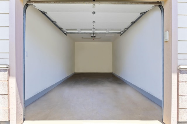 28 Hauwahine Ln Unit F203, Kihei, HI 96753 - garage featuring baseboards