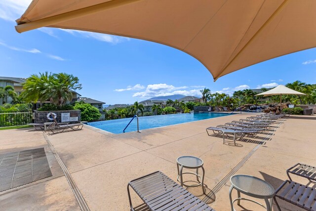 28 Hauwahine Ln Unit F203, Kihei, HI 96753 - community pool with a patio