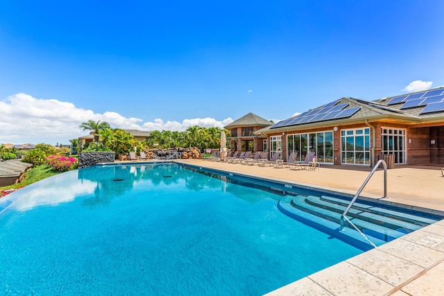 28 Hauwahine Ln Unit F203, Kihei, HI 96753 - community pool with a patio