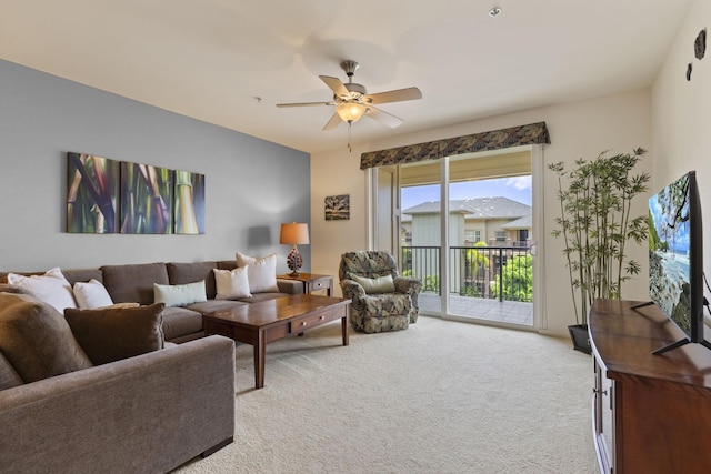 28 Hauwahine Ln Unit F203, Kihei, HI 96753 - living area with carpet flooring and a ceiling fan