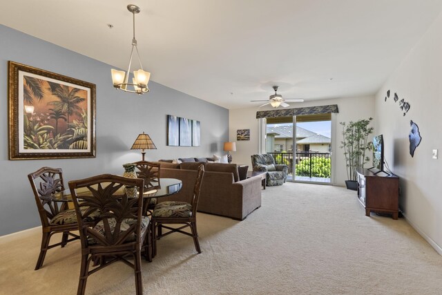 28 Hauwahine Ln Unit F203, Kihei, HI 96753 - dining area featuring light colored carpet and ceiling fan
