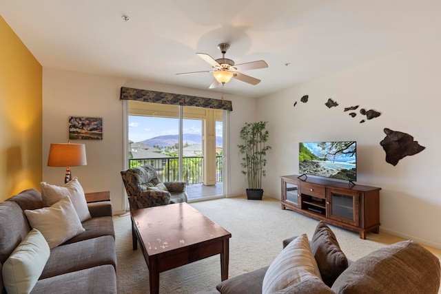 28 Hauwahine Ln Unit F203, Kihei, HI 96753 - living room with ceiling fan and light colored carpet